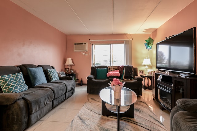 living room featuring light tile patterned floors and a wall mounted air conditioner