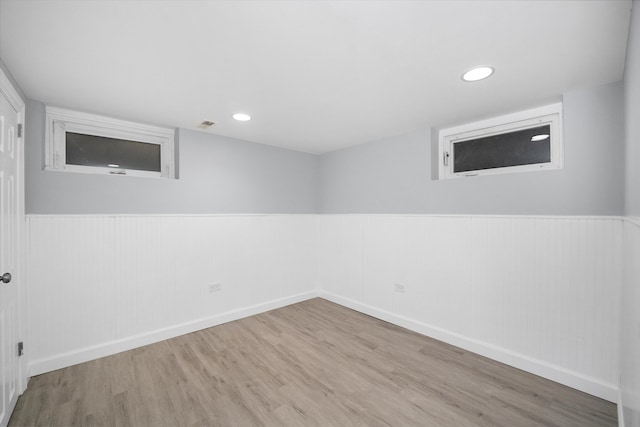 empty room featuring hardwood / wood-style flooring