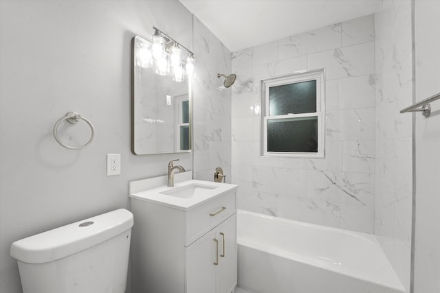 full bathroom with vanity, toilet, and tiled shower / bath combo