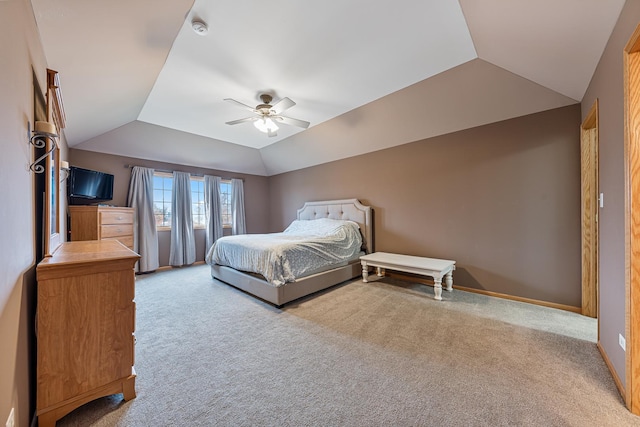 bedroom featuring ceiling fan, light carpet, and lofted ceiling