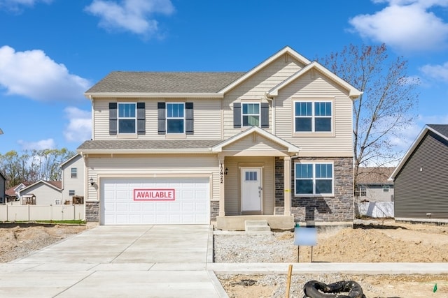 view of front of home with a garage