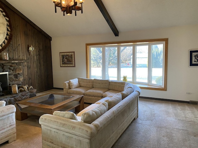 carpeted living room featuring wooden walls, a fireplace, lofted ceiling with beams, and an inviting chandelier