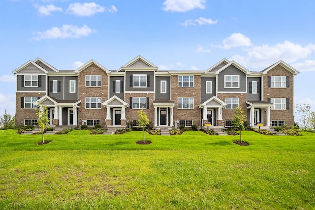 view of property with a front lawn