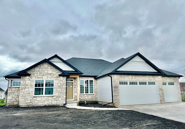 view of front of property with a garage