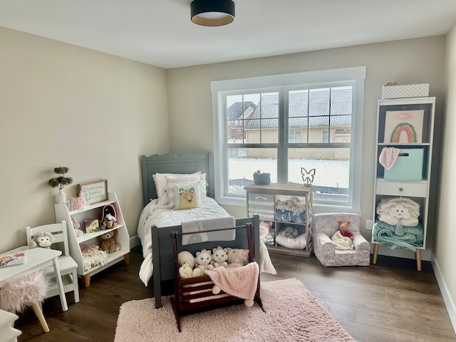 sitting room featuring dark hardwood / wood-style floors