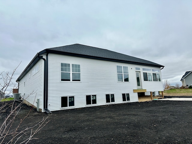 view of home's exterior featuring cooling unit