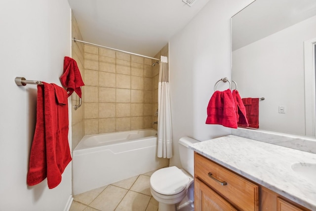 full bathroom with tile patterned flooring, vanity, shower / bath combo, and toilet