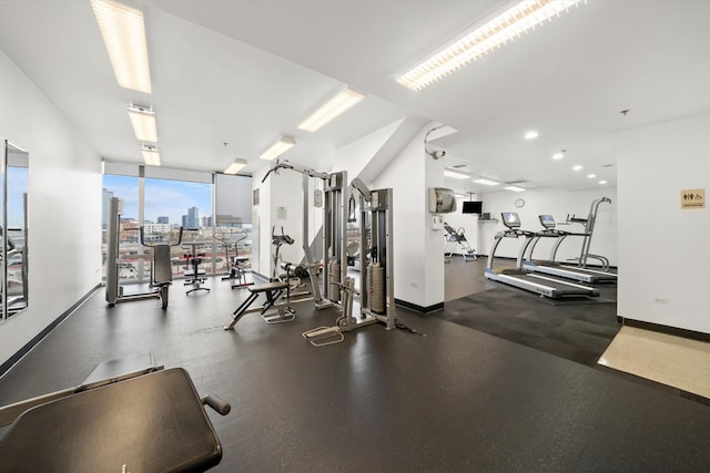 workout area with a wall of windows