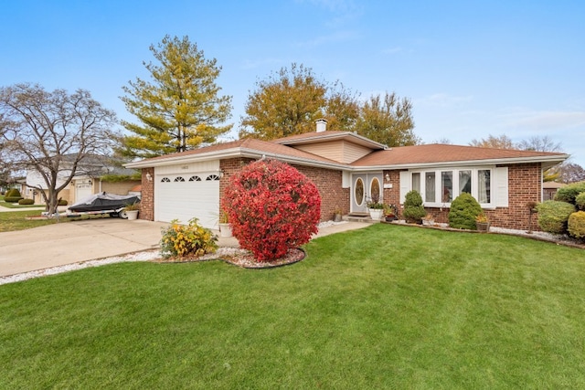 ranch-style home featuring a garage and a front yard