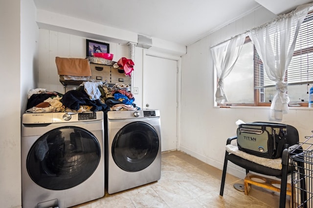 washroom with separate washer and dryer