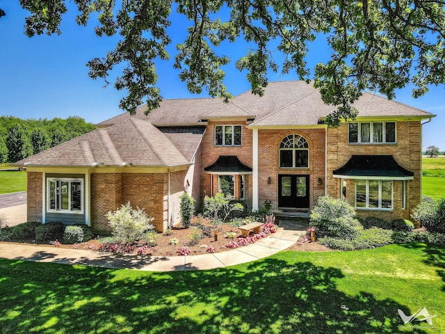 view of front of house with a front lawn