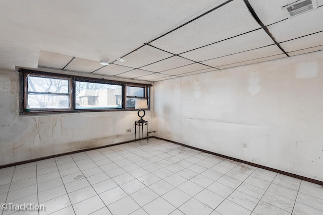 basement with a drop ceiling