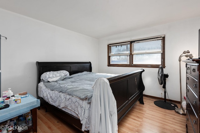 bedroom with light hardwood / wood-style floors