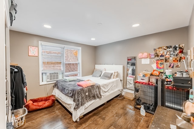 bedroom with wood-type flooring