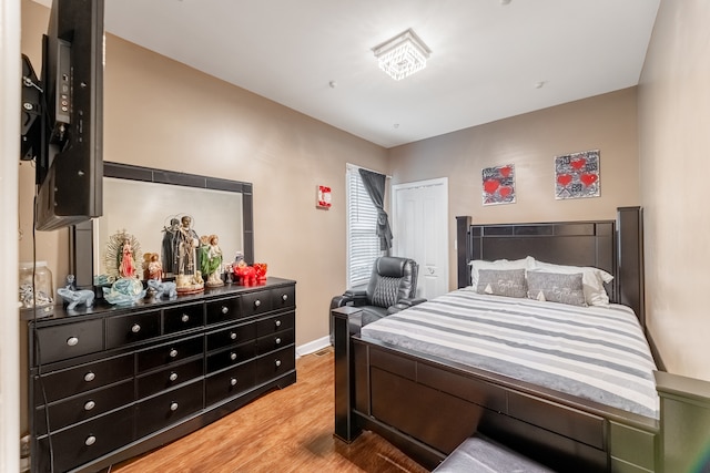 bedroom featuring light hardwood / wood-style flooring