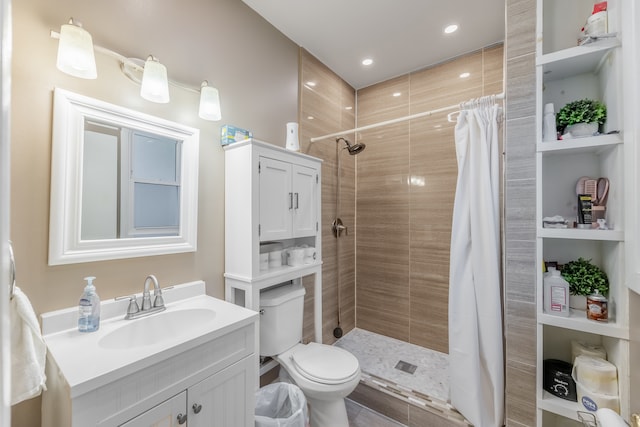 bathroom featuring vanity, curtained shower, toilet, and wood-type flooring