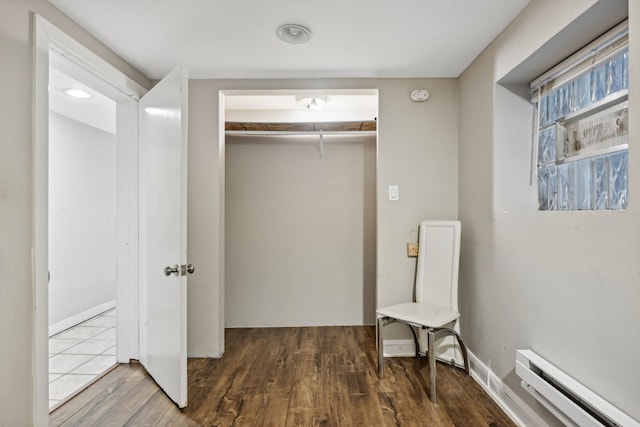 closet featuring baseboard heating