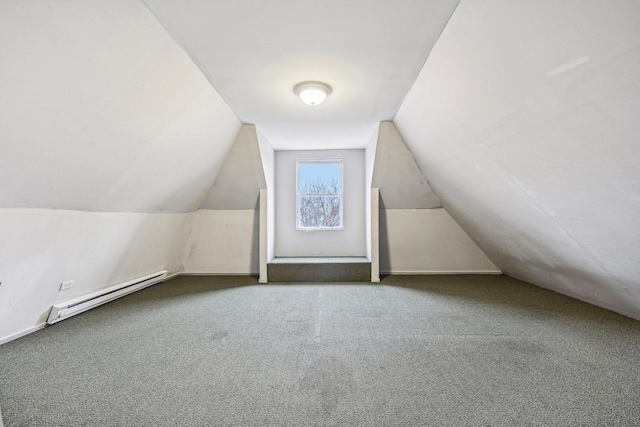 additional living space with carpet flooring, lofted ceiling, and a baseboard radiator