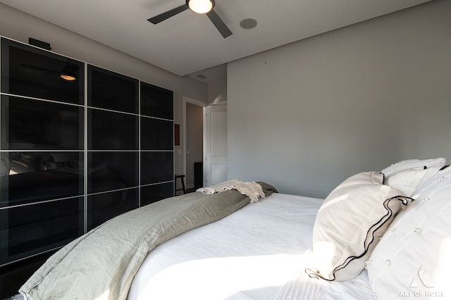 bedroom featuring ceiling fan