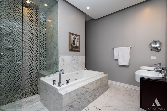 bathroom featuring vanity and separate shower and tub