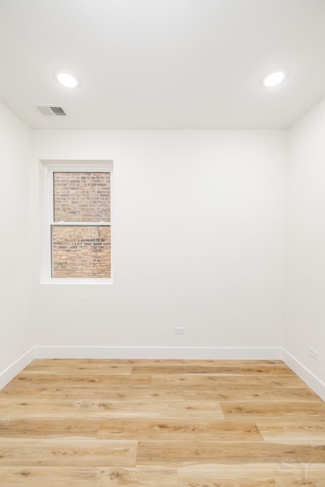 empty room featuring light hardwood / wood-style floors