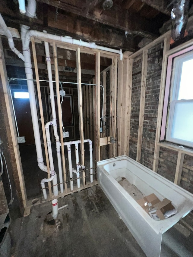 bathroom with a washtub