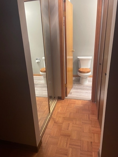 hallway featuring light parquet floors