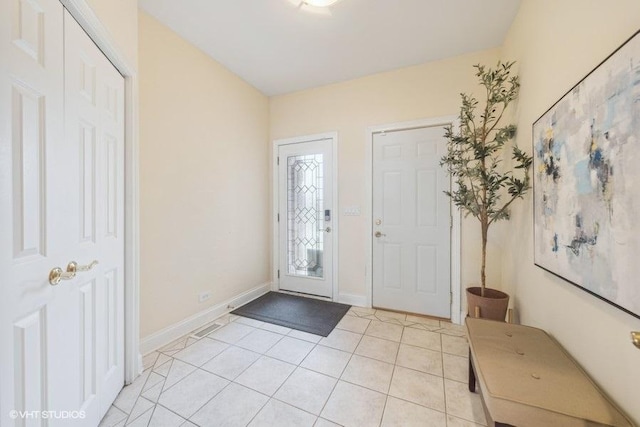 view of tiled foyer entrance