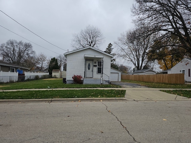 bungalow with a front lawn