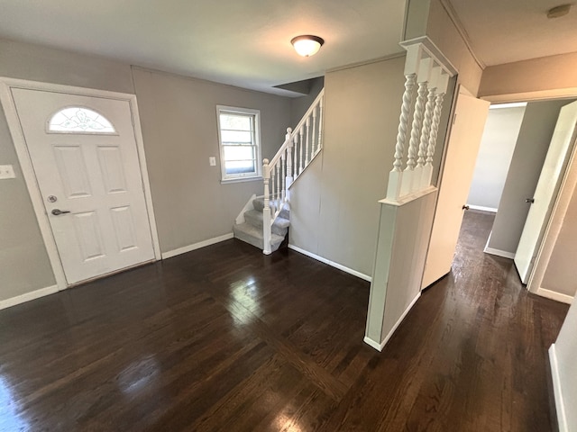 foyer entrance featuring dark hardwood / wood-style floors