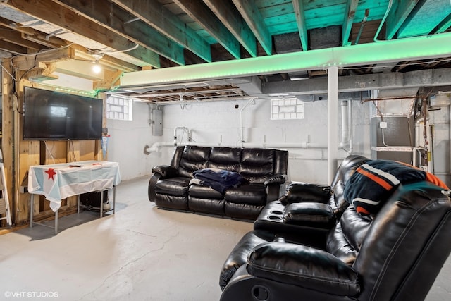 interior space with concrete flooring and electric panel