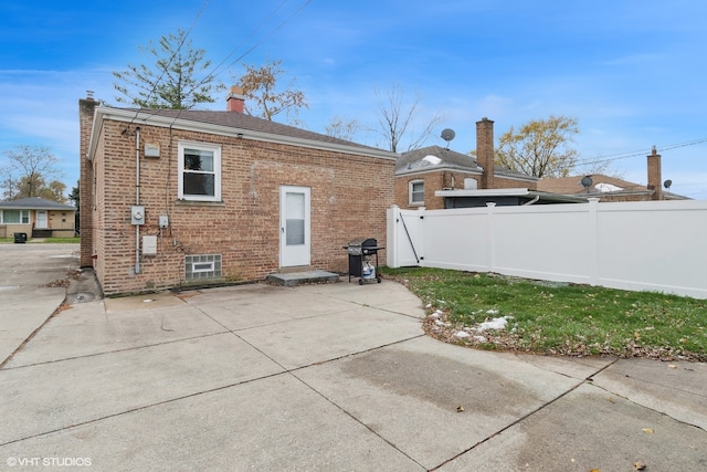 rear view of property with a patio area