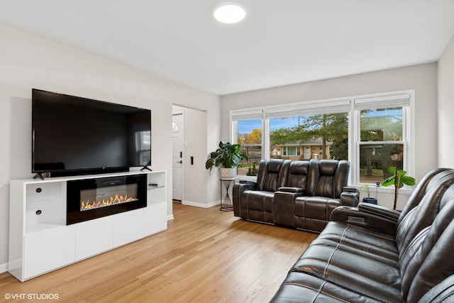 living room with light hardwood / wood-style floors