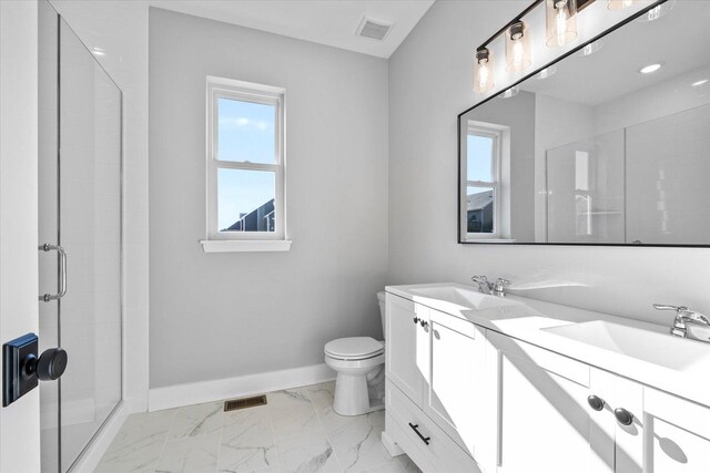 kitchen with white cabinets, decorative light fixtures, stainless steel appliances, and an island with sink