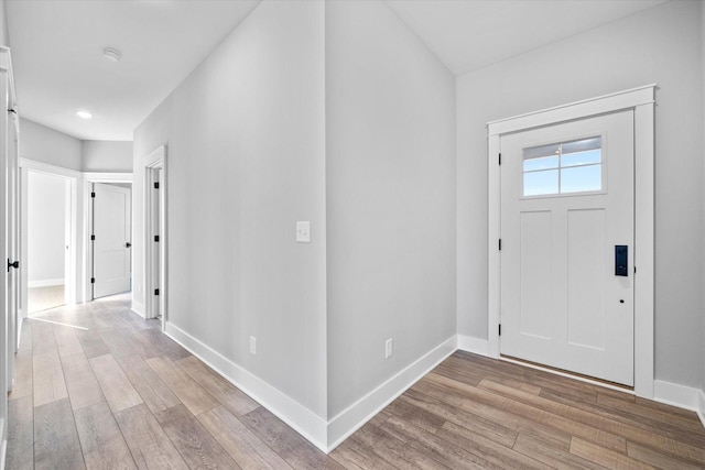 entryway with light hardwood / wood-style floors