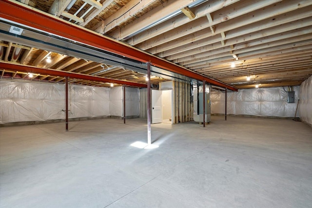 basement with heating unit and electric panel