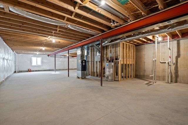 basement featuring water heater and heating unit