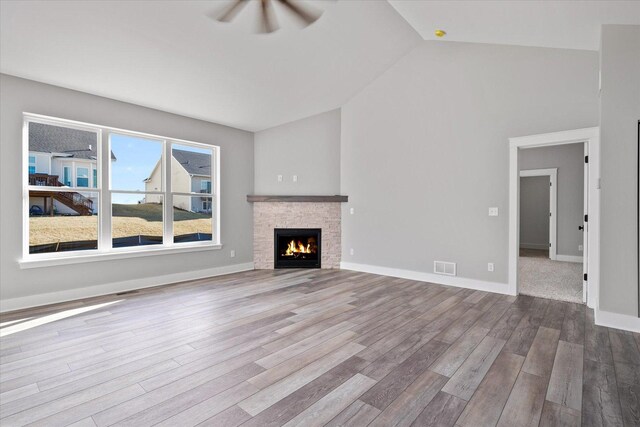 full bathroom featuring bathing tub / shower combination, vanity, hardwood / wood-style flooring, and toilet