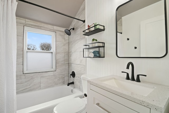 full bathroom featuring shower / bath combination with curtain, vanity, and toilet