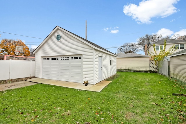 garage with a yard