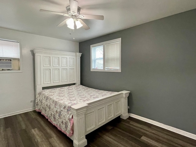 bedroom with ceiling fan and dark hardwood / wood-style floors