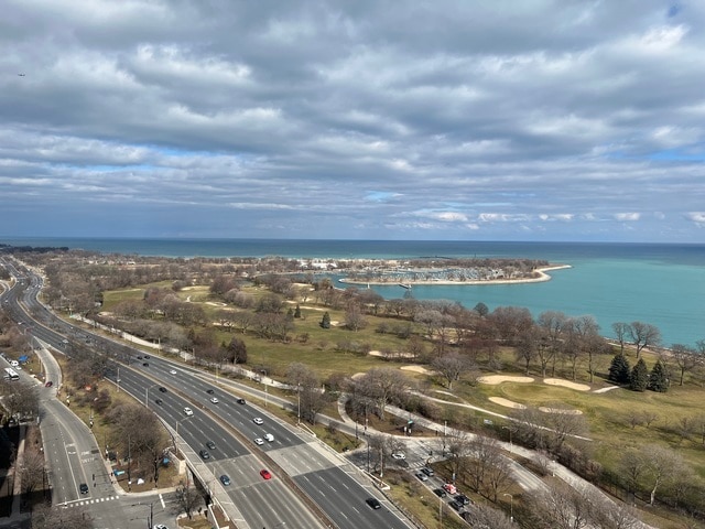 bird's eye view with a water view