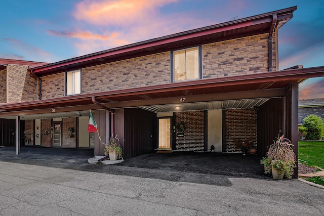 view of front of house featuring a carport