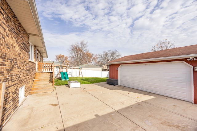 garage with a lawn