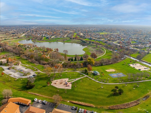 birds eye view of property featuring a water view