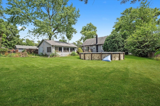 3820 W 117th St, Alsip, IL 60803 - view of green lawn with an outdoor pool
