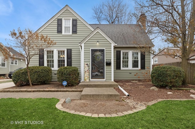 view of front of home featuring a front lawn