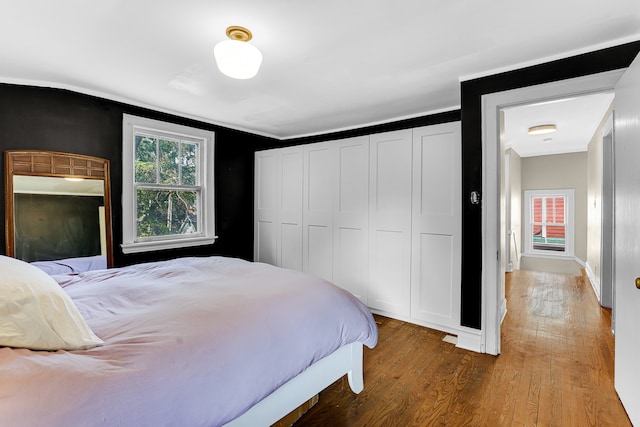 bedroom featuring a closet and hardwood / wood-style floors