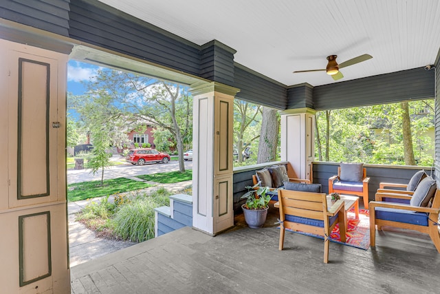 sunroom / solarium with ceiling fan