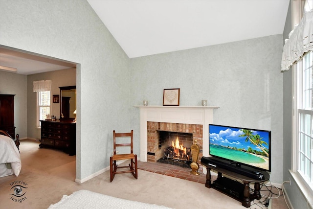 interior space with a fireplace and lofted ceiling